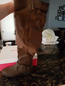 Ladies knee high just fab boots. Brand new. Never worn