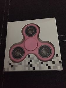 Pink fidget spinners