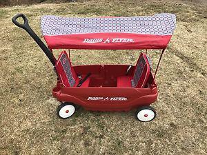 Radio Flyer red wagon with canopy and padded seats