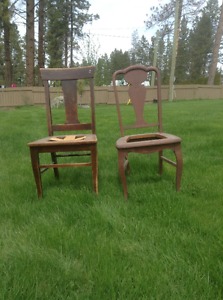 Two wooden antique chairs