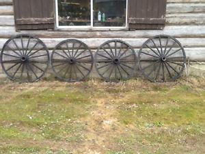 complete set of antique wagon wheels