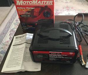 Battery charger with 75 amp Engine start used once.