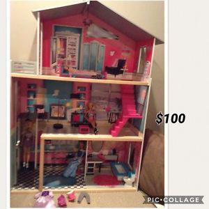 Doll house, barbies, and accessories