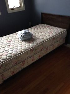Extra long twin bed with set of sheets