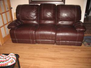 Leather reclining couch and love seat.