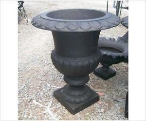 Looking for 2 cast iron flower pots