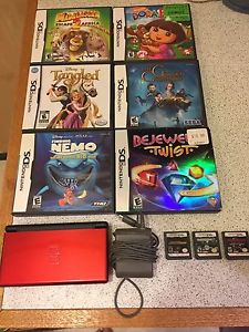 Nintendo DS with 9 games and charger.