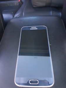 Samsung S6 Unlocked. Has crack across screen but works good.