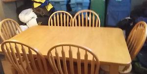 Solid Oak Table... With 6 Matching Chairs