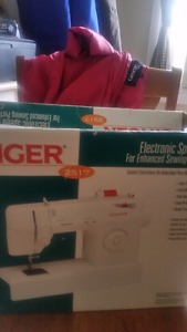 Three gently used sewing machines