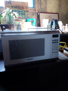 White microwave with manual for sale