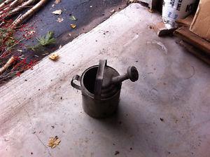 metal bucket and watering can
