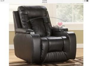 Black leather recliner, theatre seating