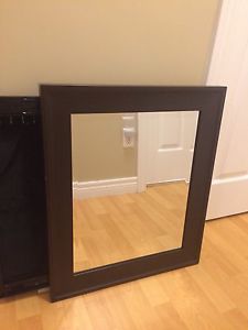 Mirror with jewelry pannel behind