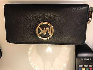 Wanted: Authentic mk black leather wallet $80