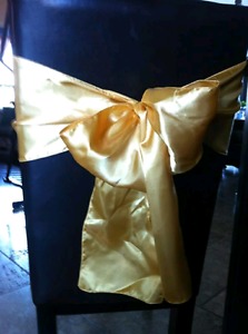Yellow gold chair sashes and table runners