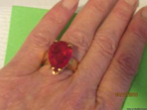 MARKED DOWN. 10 k yellow gold ring big ruby stone$400