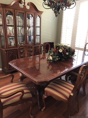 Cherry Wood dining room table for 8 and hutch