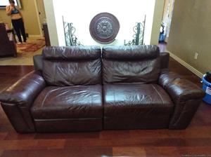 Leather sofa with matching recliner.