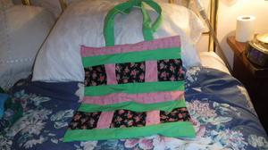 Nice hand sewn light green and pink purse with zipper