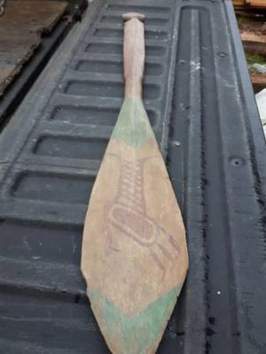 Native hand carved paddle