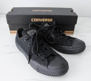 Solid black low top all star converse