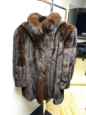 Dark ranch mink coat with fox trim and hood
