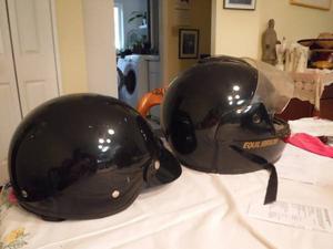 2 large motorcycle helmets