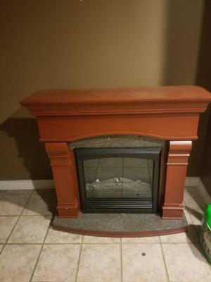 Electric wood stove style heater