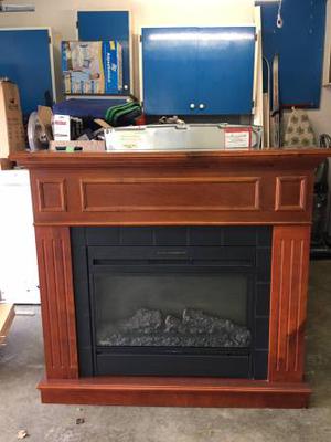 Free-standing electric fireplace