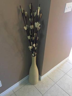 Floor vase with decorative sticks