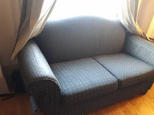 Two-person green sofa