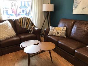 Leather couch and side tables