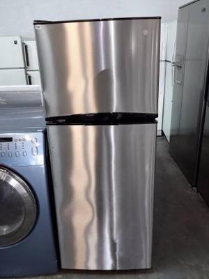 Apartment size stainless steel fridge