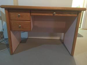 Peach-colored commercial desk