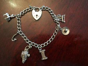 Beautiful Sterling Silver Bracelet with Beautiful Charms