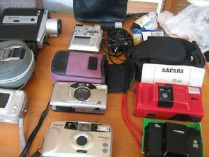 Table Full of Vintage CAMERAS--$99.all