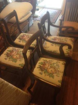 Four antique dining room chairs