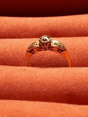 Woman's engagement/dress ring with five diamonds