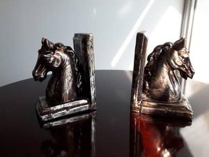 decorator downsizing pair of horse book ends