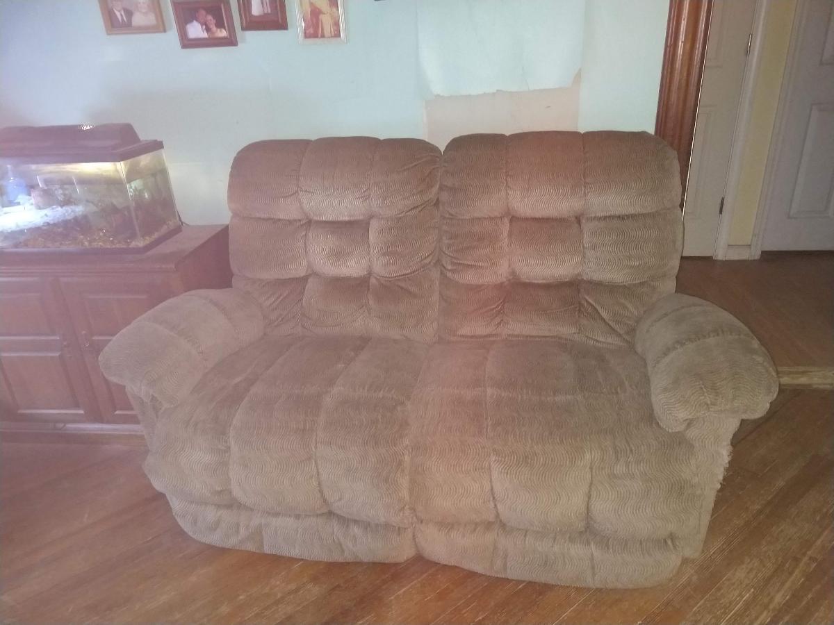 Overstuffed reclining couch and love seat