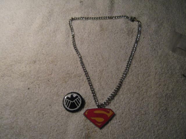 Superman Medallion on a 14 inch chain, with some sort of
