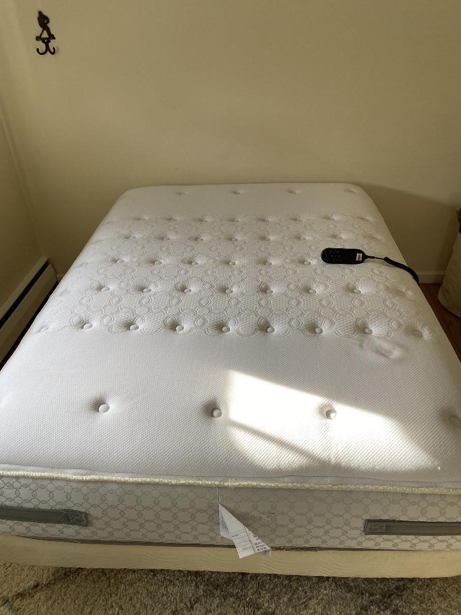 Full sized Sealy posturpedic mattress and adjustable frame
